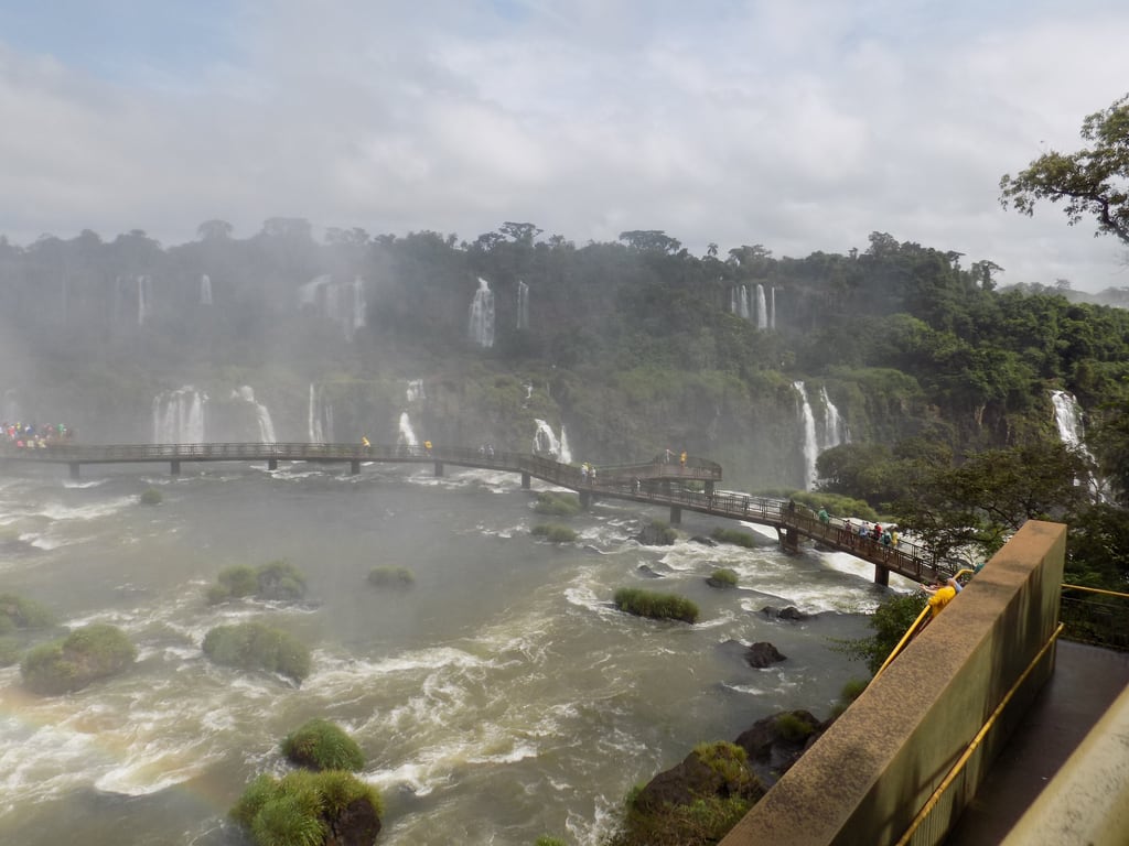 Iguaçu Falls with the observation walkway visible against the water