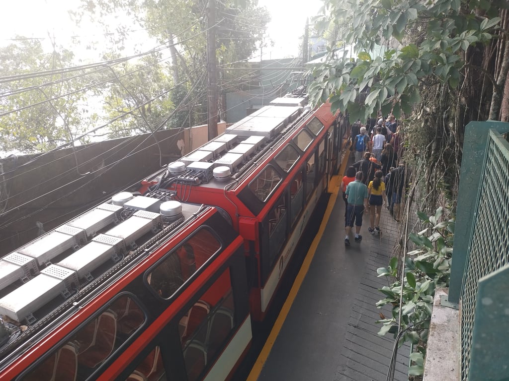 A fourth-generation Corcovado rack railway train at the Cristo Redentor station