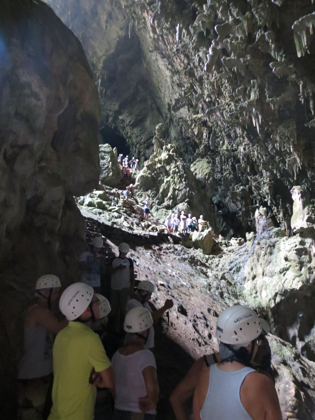 Visitors dwarfed by the chamber of Gruta do Lago Azul