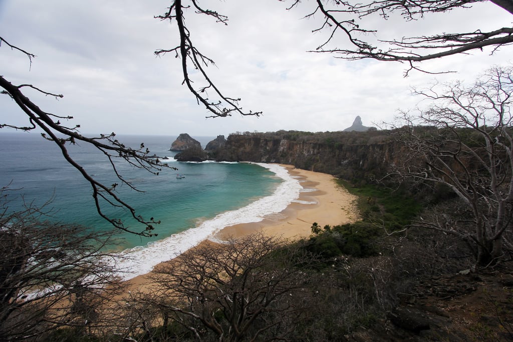 Baía do Sancho seen from the sand, enclosed by high cliffs