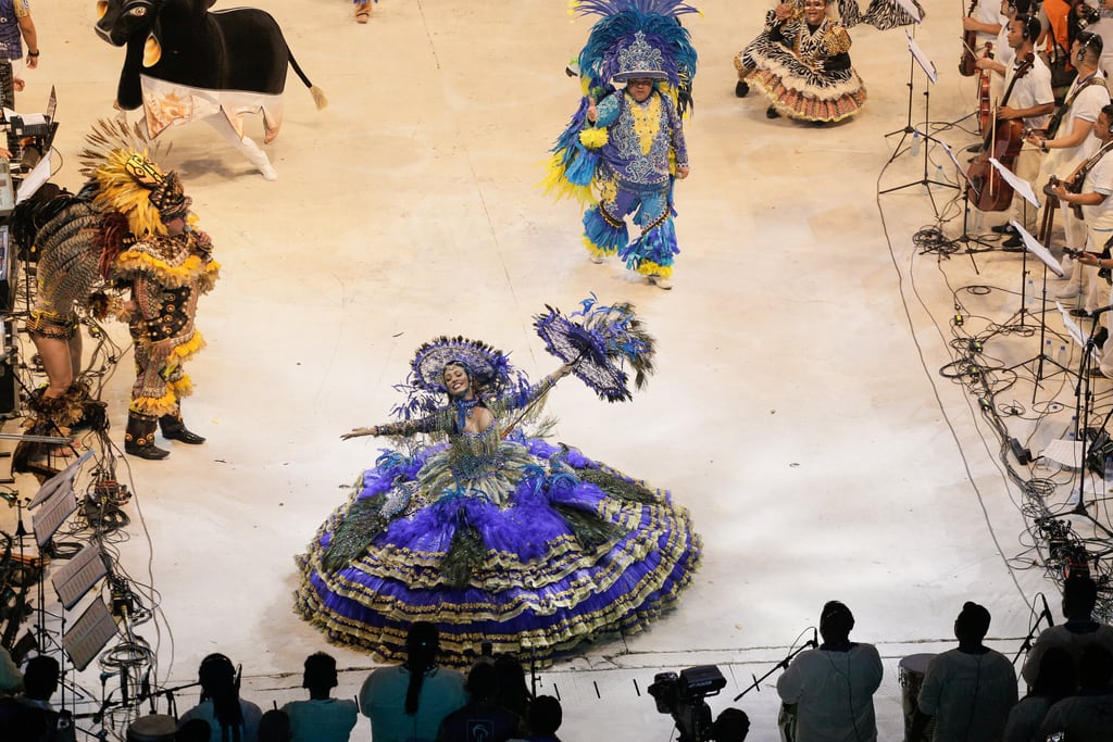 Half of the Parintins arena in coordinated colour during a performance